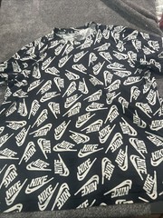Nike Tee Men’s All Over Logo Print Graphic T-Shirt size 2XL Black AOP
