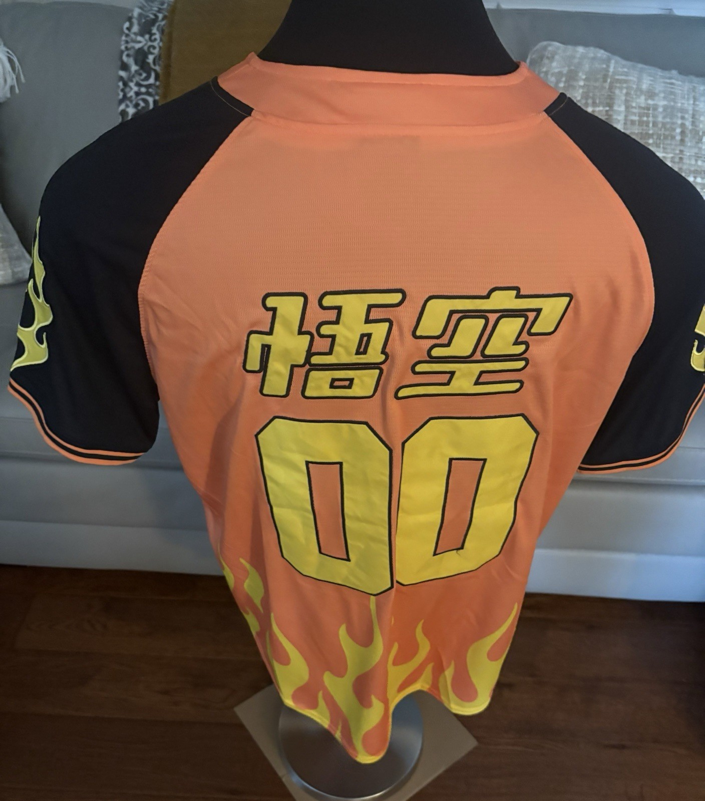 BoxLunch exclusive Dragon Ball Z flame baseball jersey with Goku's kanji symbol. gallery