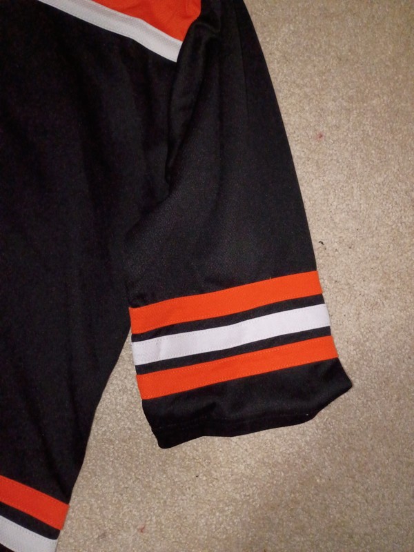 Spirit Halloween Hockey Jersey Men's Youth Size XL #31 Orange Black Horror gallery