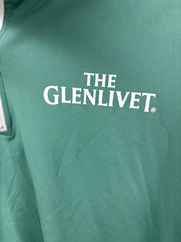 The Glenlivet 1/4 zip pullover top. Size large. Long sleeve. 85/15 poly/spandex. gallery