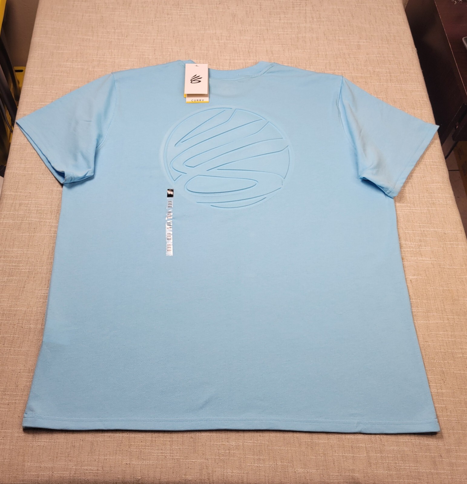 Under Armour Curry Shirt 2XL Men Light Blue Embossed Logo Tee Loose Fit Crewneck gallery