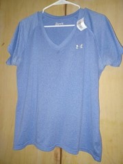 under armor active tee light blue v neck. 28inches long and 19 1/2 wide