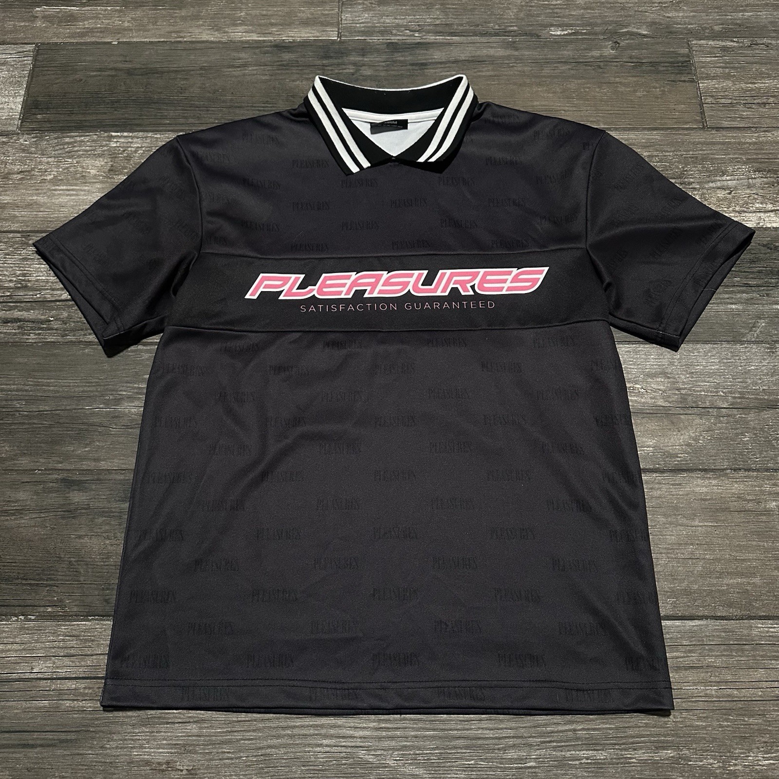 PLEASURES SATISFACTION GUARANTEED BLACK PINK AOP SOCCER JERSEY SZ M ALL OVER gallery