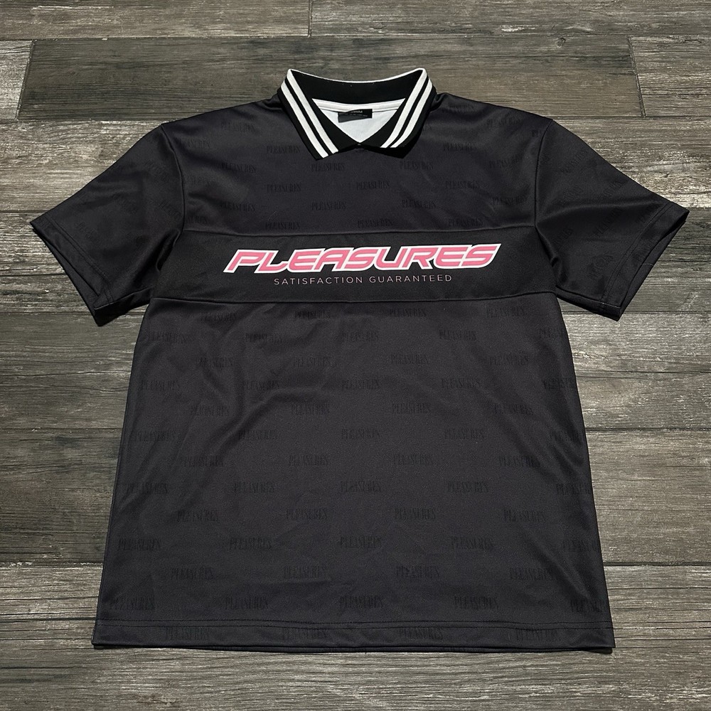 PLEASURES SATISFACTION GUARANTEED BLACK PINK AOP SOCCER JERSEY SZ M ALL OVER