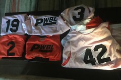 PWBL Orange & white reversible Jump jerseys (6) VGC’s!! 2 3 5 12 19 42 All LARGE