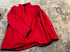 Under Armour Cold Gear Men’s 1/4 Zip Pull Over Jacket in size 3XL is a solid red