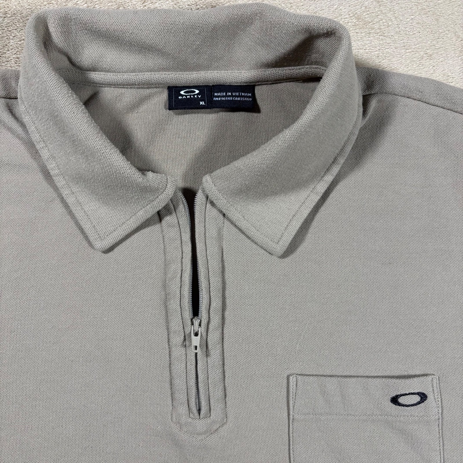 Oakley 1/4 Zip Short Sleeve Tan Polo w/ Chest Pocket - Men's XL gallery