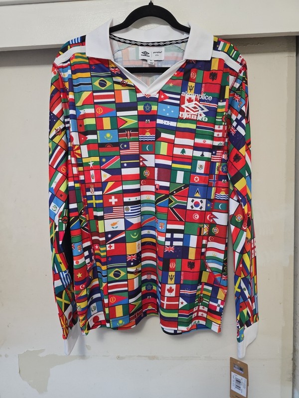 NEW Akomplice X Umbro Vibrant WORLD FLAGS Embroidered PEACE DOVE L/S Polo Jersey gallery