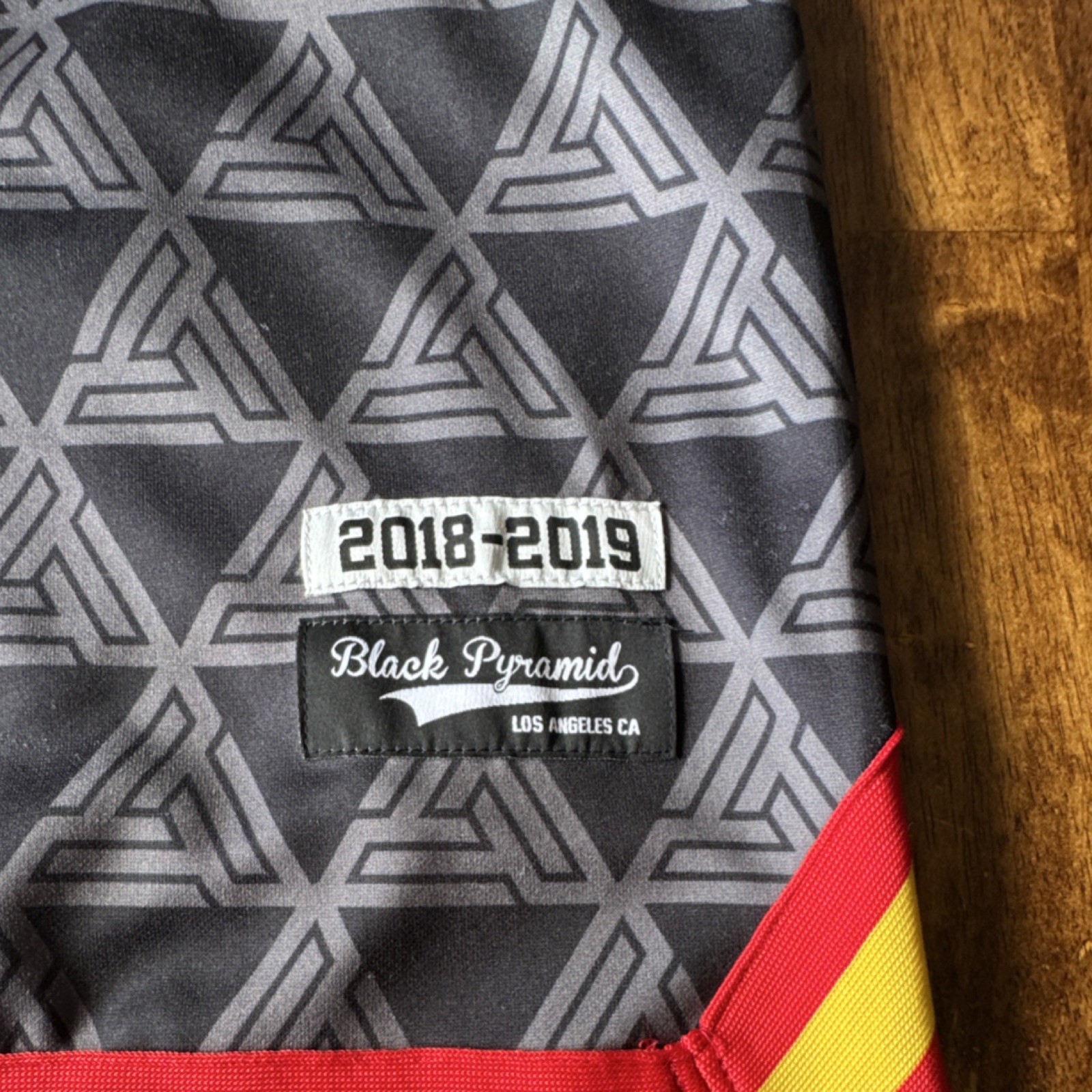 Black Pyramid 2018-2019 Logo Jersey Black Red Yellow Gray Men's Large V-Neck gallery