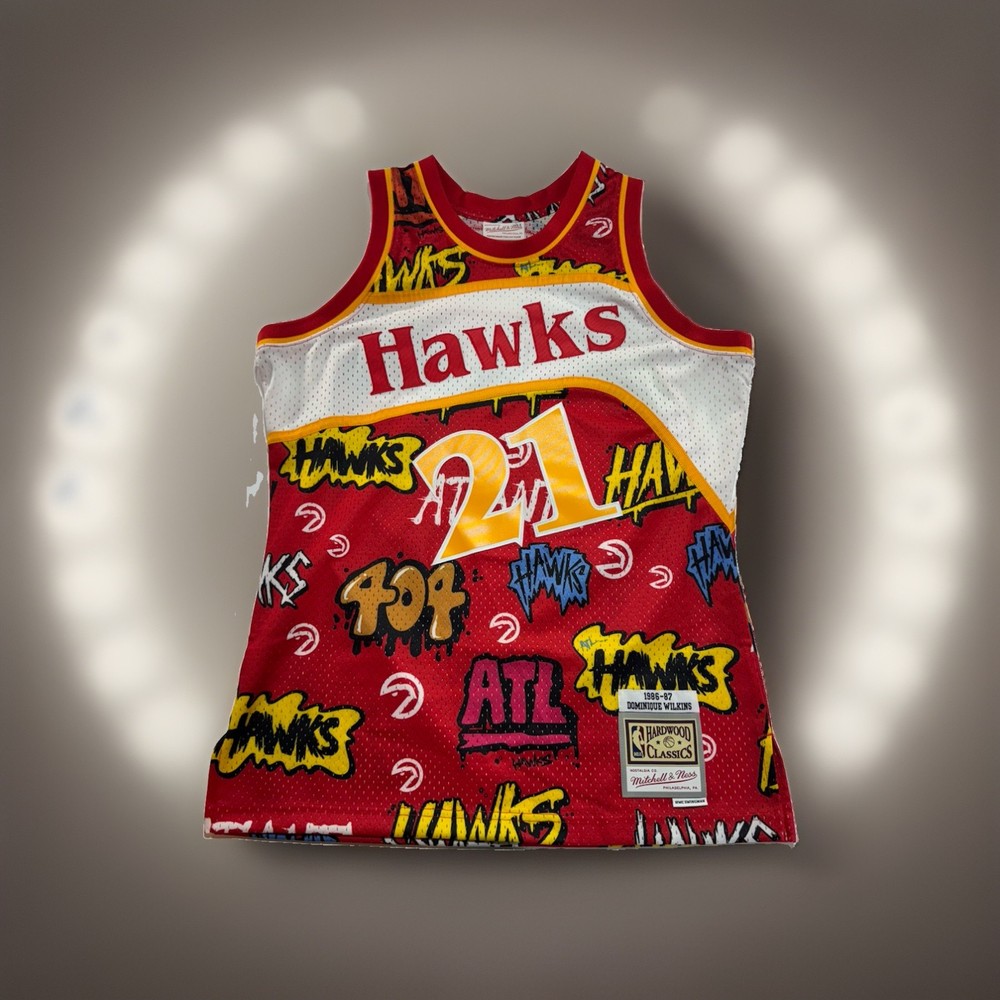 MENS MITCHELL & NESS SLAP STICKER SWINGMAN JERSEY HAWKS 1986 DOMINIQUE WILKINS