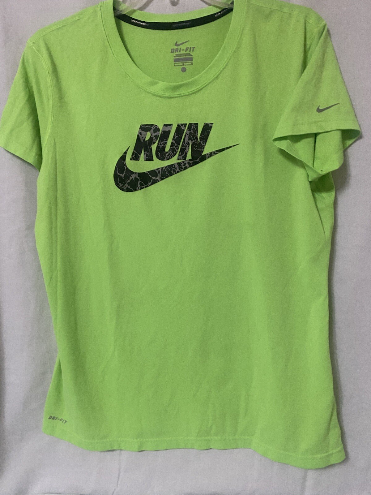 NIKE DRI FIT Tshirt Size Large With Blue Swoosh On Front And Left Sleeve gallery