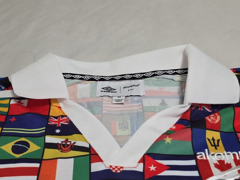 NEW Akomplice X Umbro Vibrant WORLD FLAGS Embroidered PEACE DOVE L/S Polo Jersey gallery