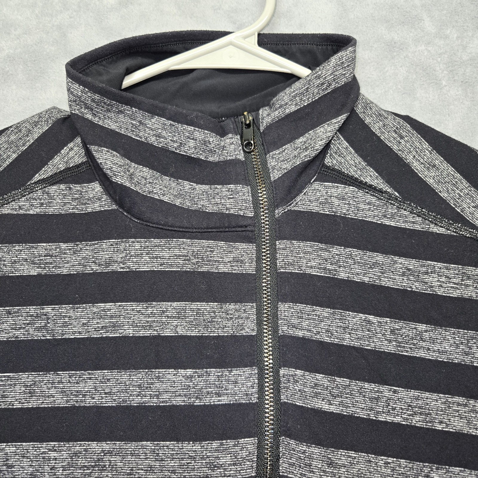 Lululemon Men's Medium? Asymmetrical Black And Gray Striped 1/4 Zip Longsleeve gallery