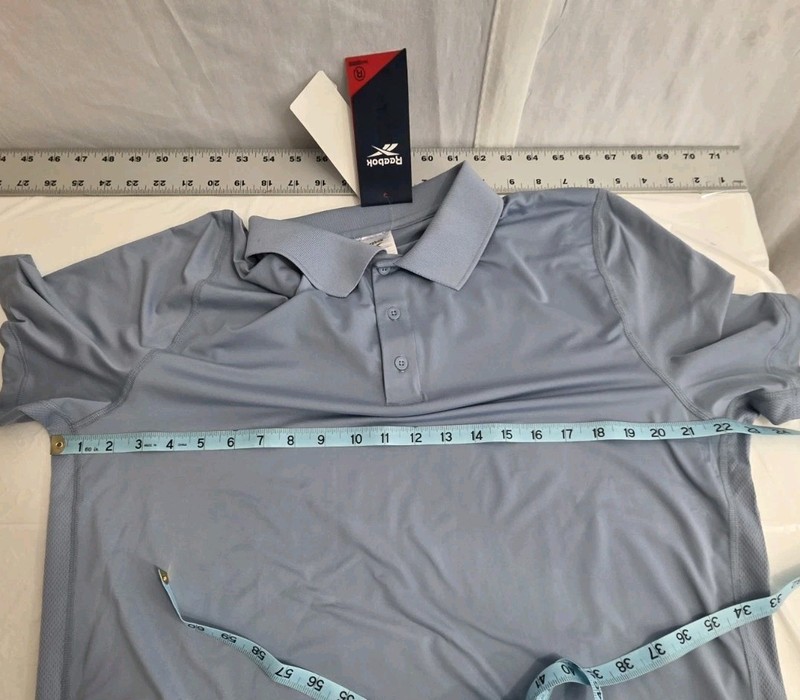 NWT Reebok Short Sleeve Performance Training Polo Shirt Men L Vntg Blue Pullover gallery
