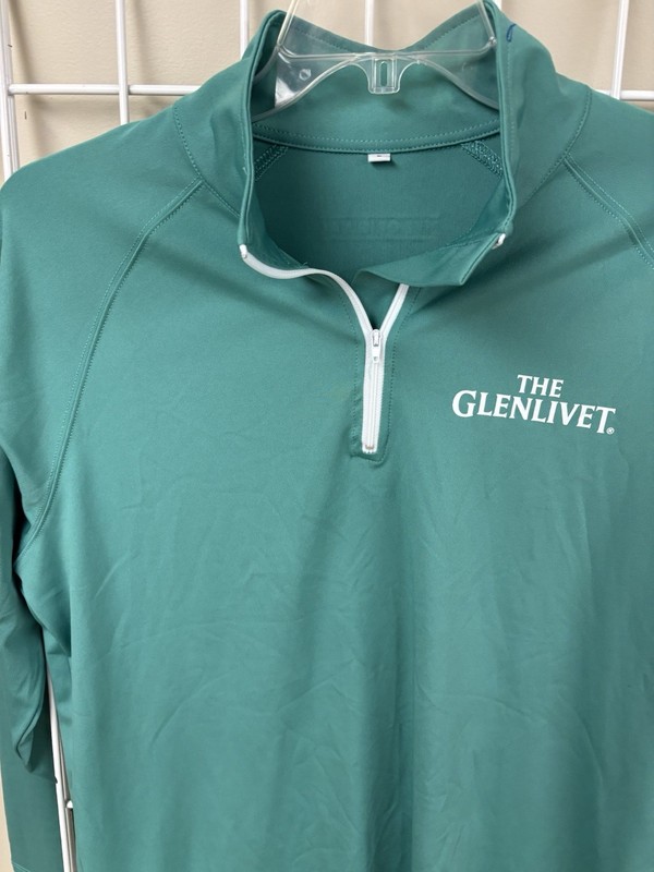 The Glenlivet 1/4 zip pullover top. Size large. Long sleeve. 85/15 poly/spandex. gallery