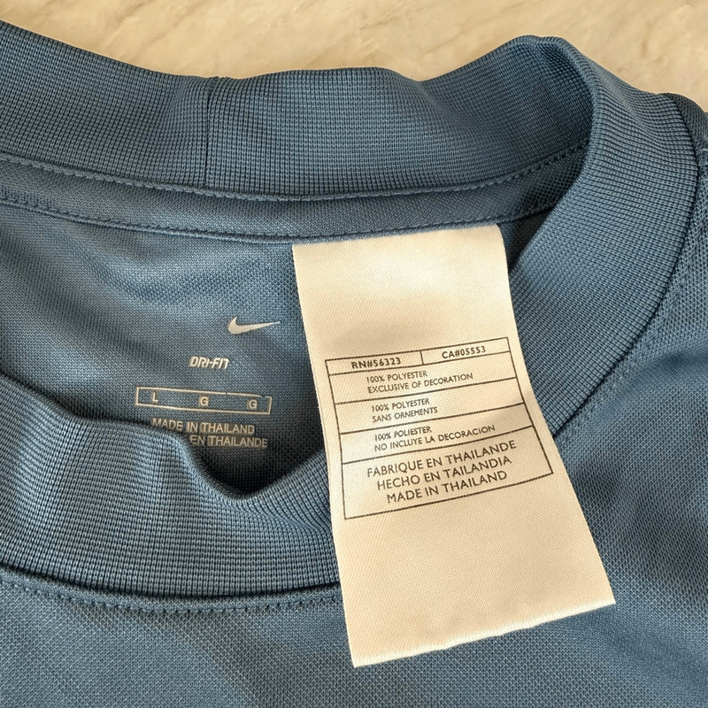 Nike teal Y2K tennis shirt white and yellow tennis ball splash graphic size L gallery