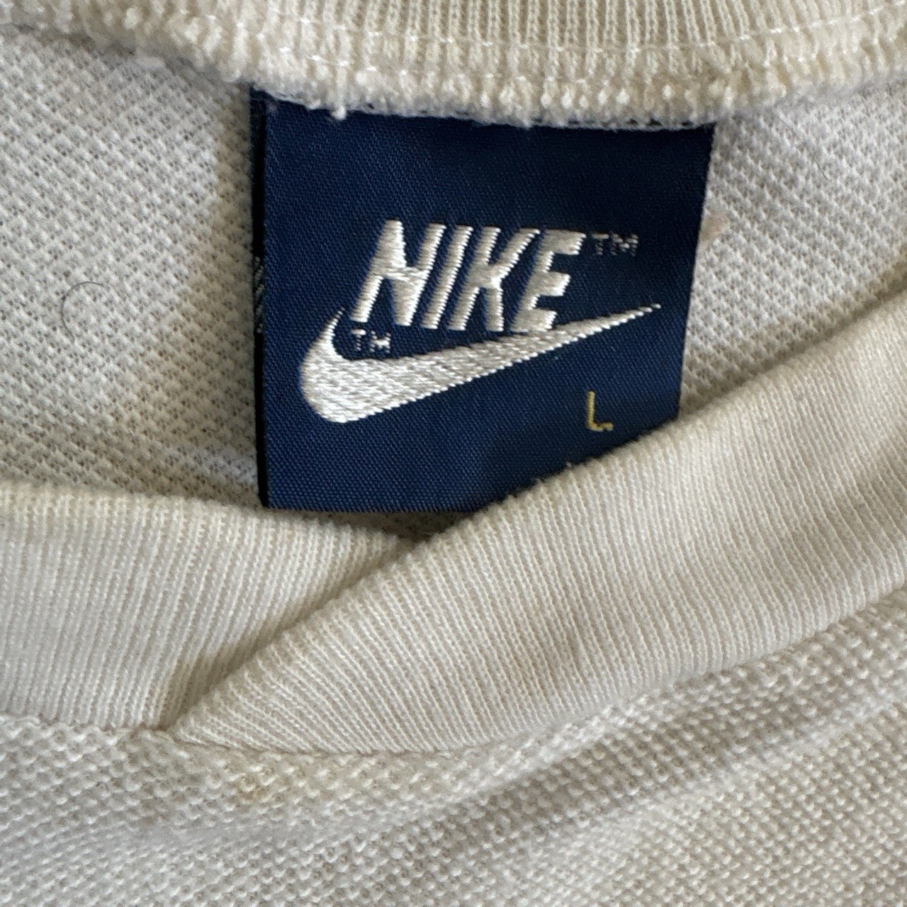 Size large vintage Nike sleeveless jersey features a color-blocked design gallery