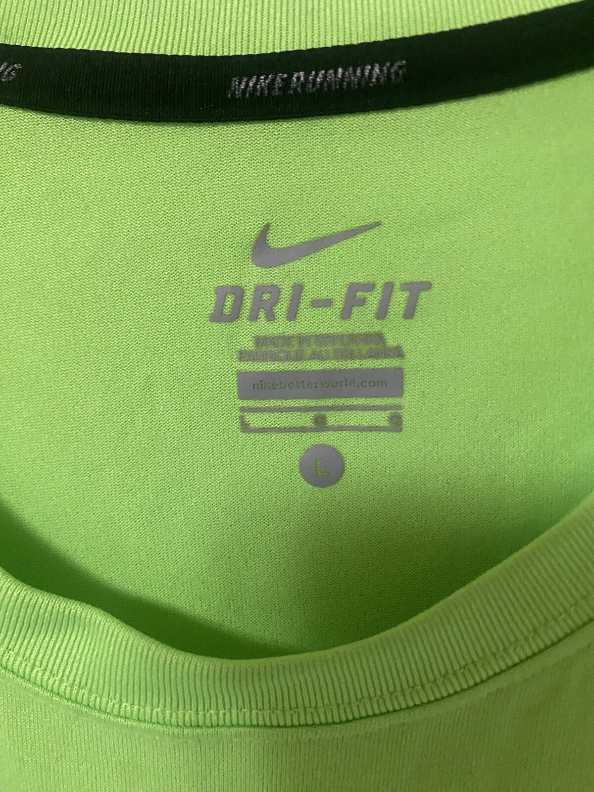NIKE DRI FIT Tshirt Size Large With Blue Swoosh On Front And Left Sleeve gallery