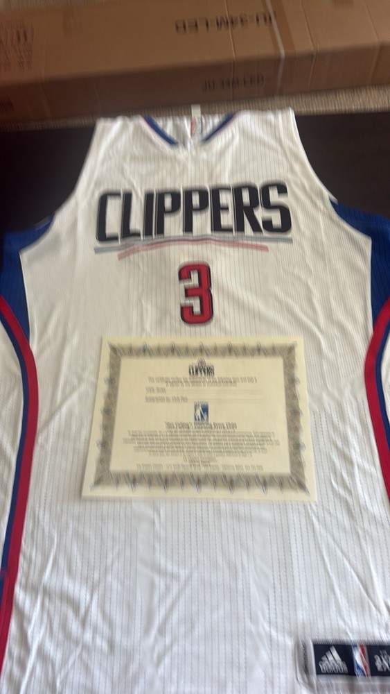 Authentic Signed Chris Paul Clippers Jersey in White with Blue and Red