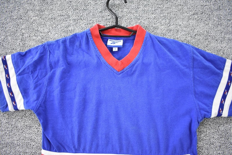 Vintage 90s Reebok Tee Mens XS Blue Red Spell Out Color Block Short Sleeve gallery