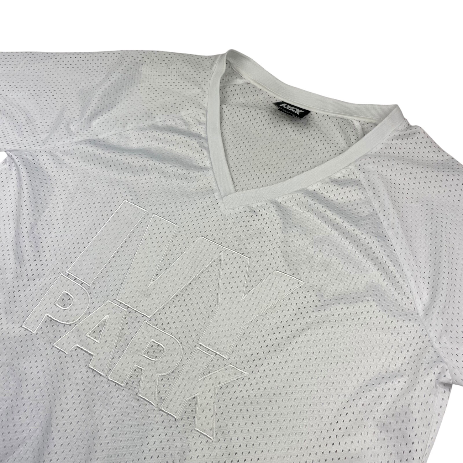 Ivy Park Men’s #04 Embroidered V-Neck Mesh Jersey White • Large gallery