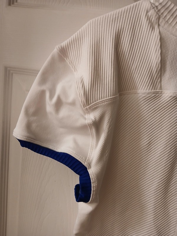 Adidas Football Compression Shirt. White With Blue Trim. NWT. Size 2XL. gallery