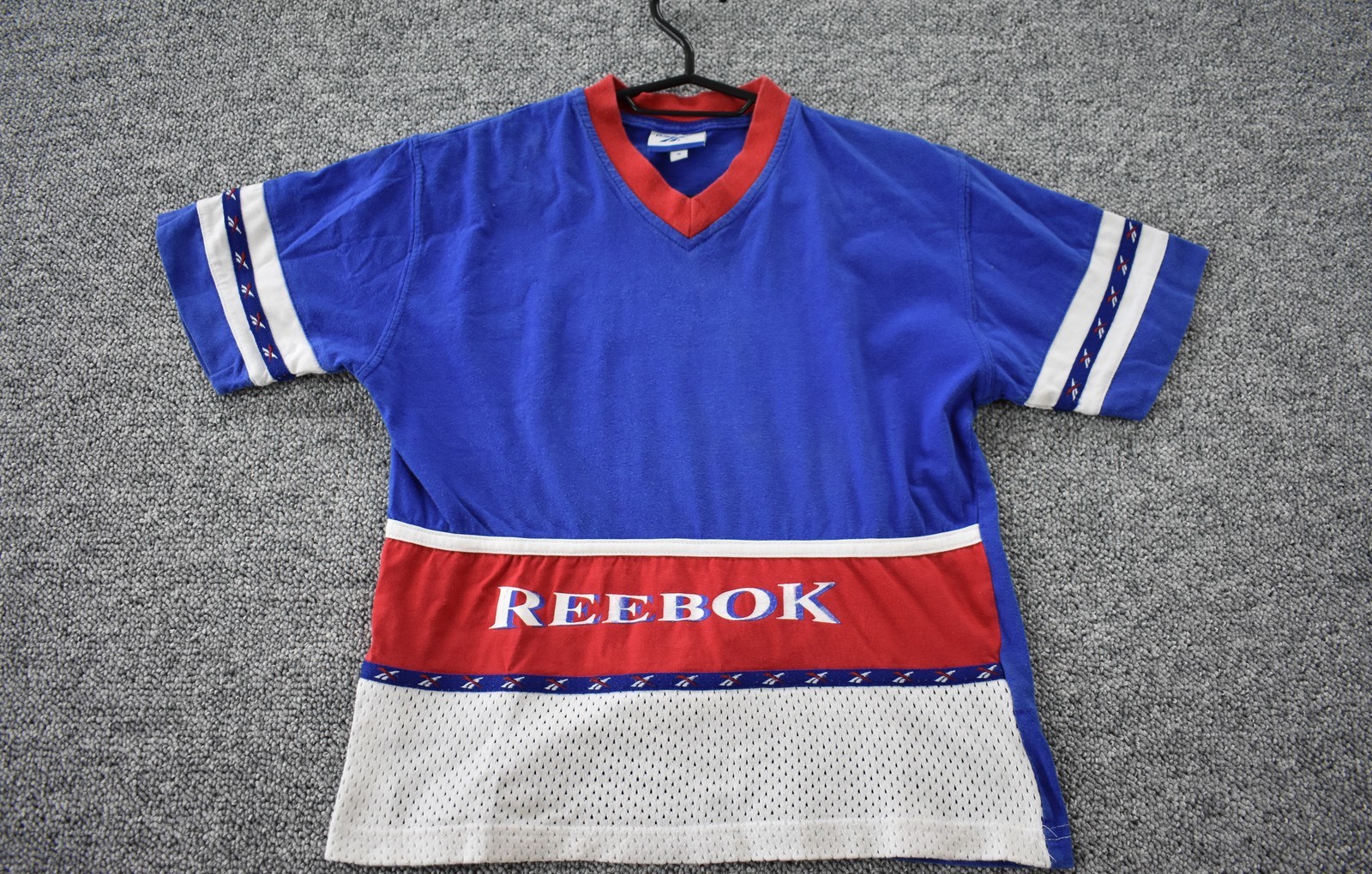 Vintage 90s Reebok Tee Mens XS Blue Red Spell Out Color Block Short Sleeve gallery