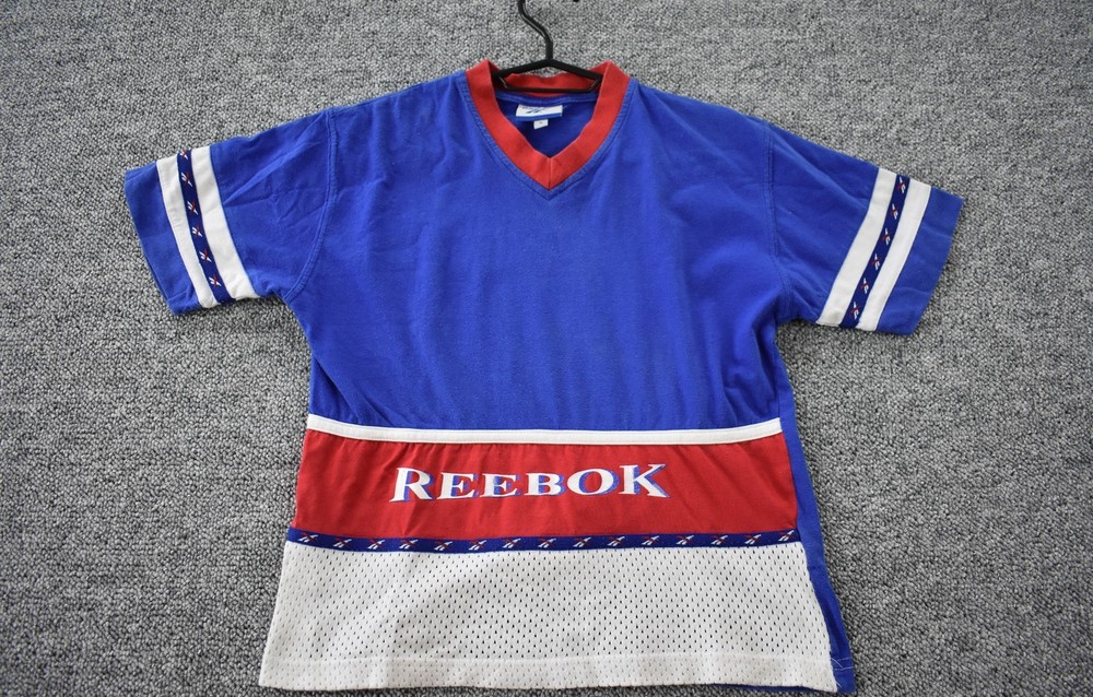 Vintage 90s Reebok Tee Mens XS Blue Red Spell Out Color Block Short Sleeve