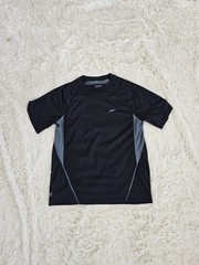 Speedo men’s performance or running shirt in a large size.