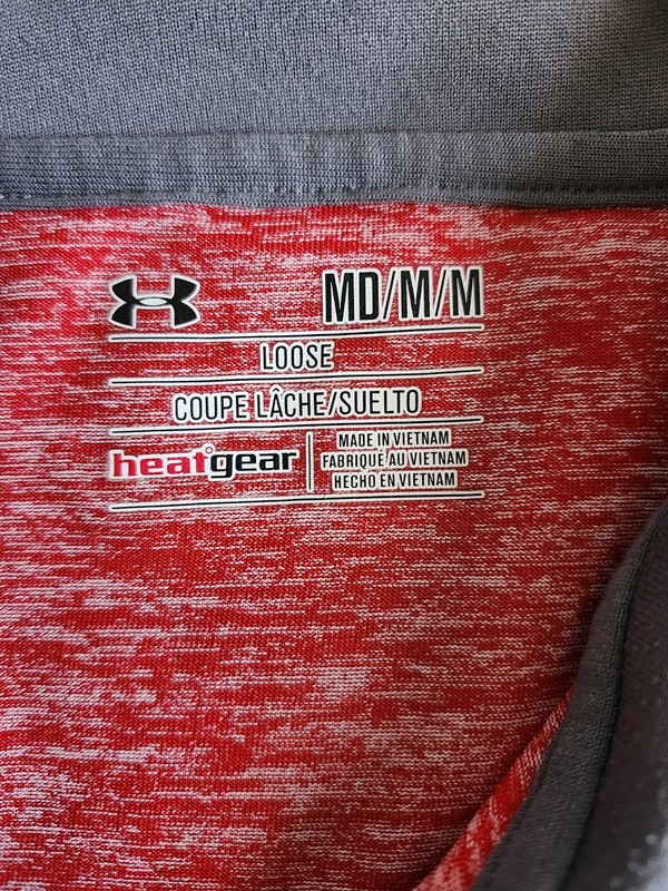 Under Armour UA Tech 1/2 Zip long-sleeve shirt in a red heathered pattern. gallery