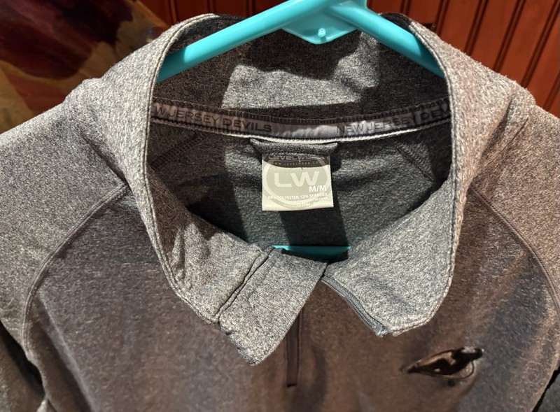 NJ Devils Quarter zip. Sharp grey with NHL logo. Medium gallery
