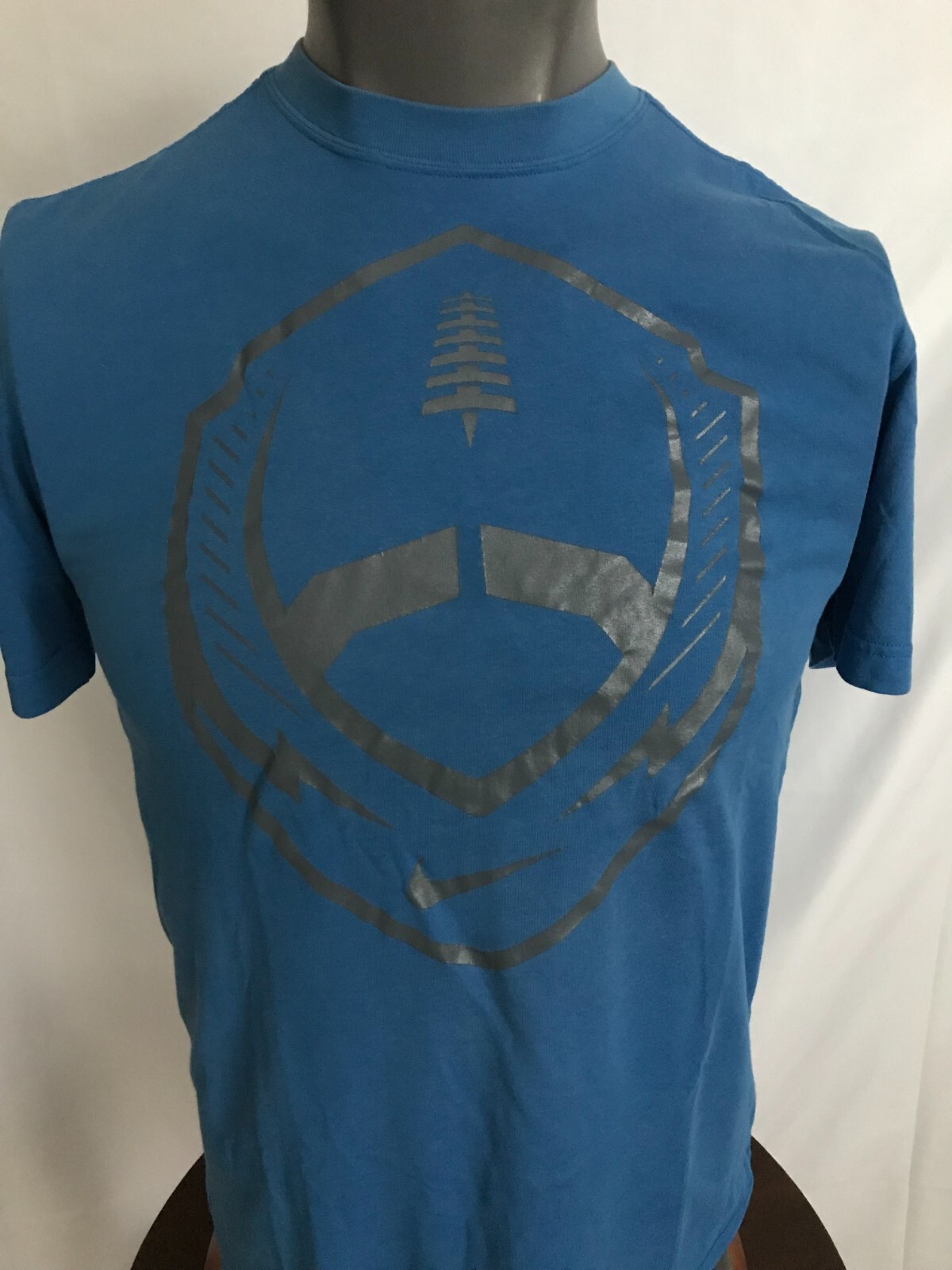 Nike Mens Fits like Small (Marked as Medium) Tee Shirt Blue with Football Logo gallery