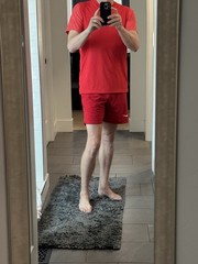 Red Nike Large Top And Medium Bottom.