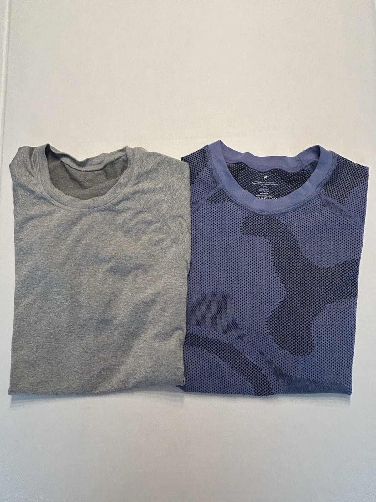 Lot Of 2 Men’s Fabletics Seamless Short Sleeve Tshirts Purple & Gray Small gallery
