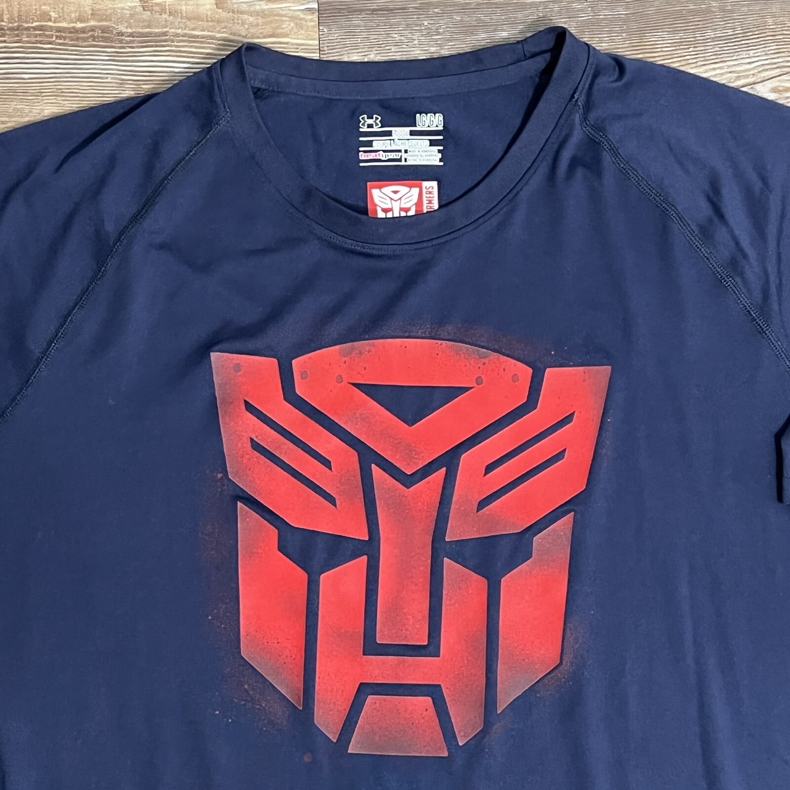 Under Armour Transformers AutoBots Logo HeatGear Navy Blue Shirt Mens Size Large gallery