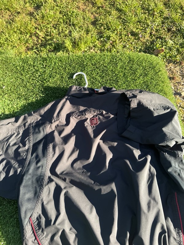 3 FootJoy Men half sleeve quarter zips and 1 under armour. Emerald Bay logos gallery