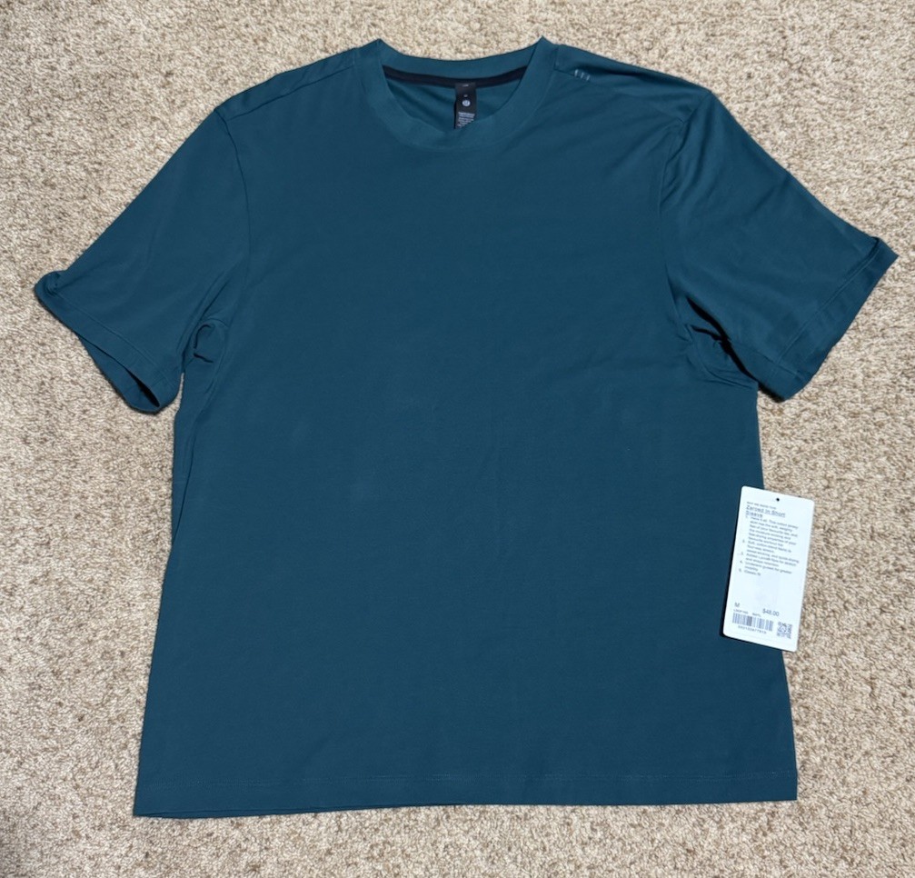 NEW Lululemon Men’s Size Medium Storm Teal Zeroed In Short Sleeve Shirt gallery
