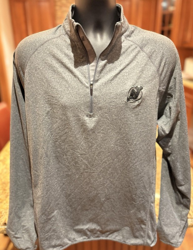 NJ Devils Quarter zip. Sharp grey with NHL logo. Medium gallery