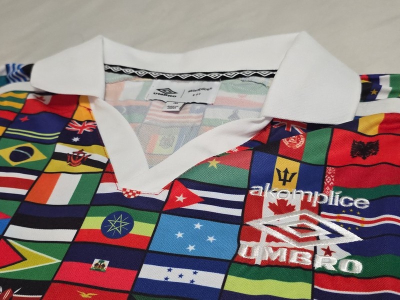 NEW Akomplice X Umbro Vibrant WORLD FLAGS Embroidered PEACE DOVE L/S Polo Jersey gallery