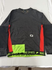 Nike Therma Project X Long Sleeve Training Top in black, volt, and red