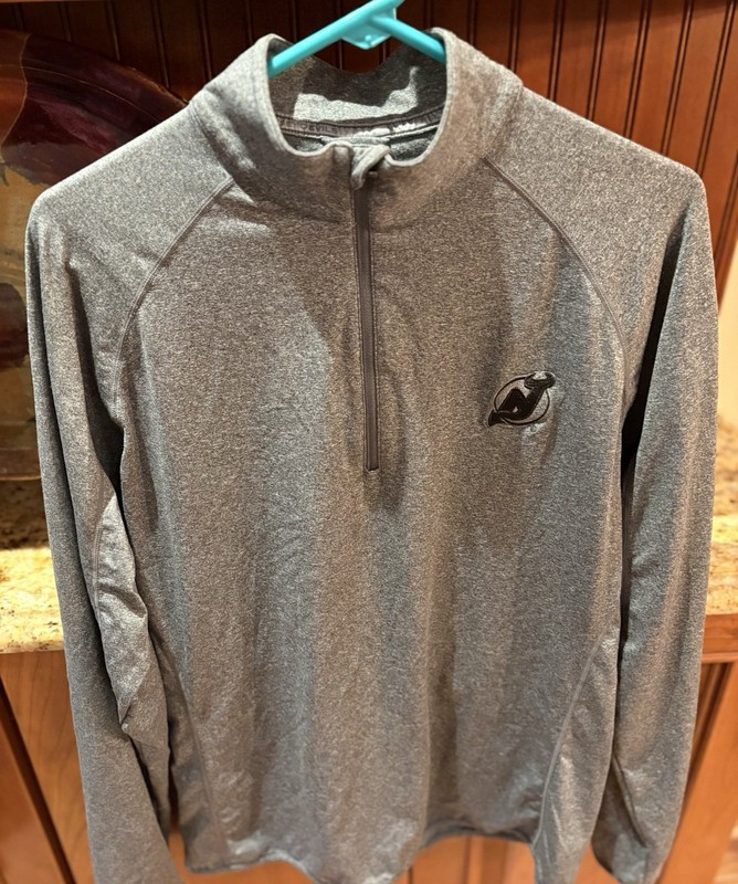 NJ Devils Quarter zip. Sharp grey with NHL logo. Medium gallery