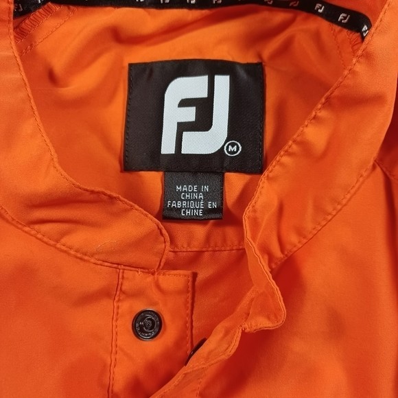 FootJoy mens solid orange 1/4 snap button windbreaker pullover M EUC gallery