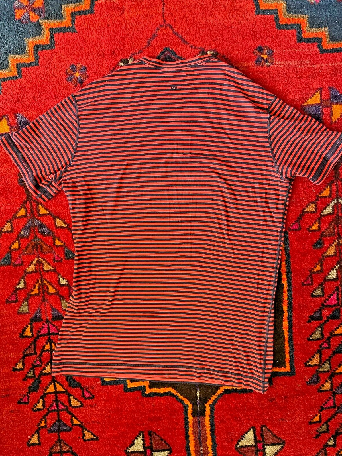 Lululemon Men’s Striped Tech Short Sleeve marked Med, 19 inch chest, unique Logo gallery