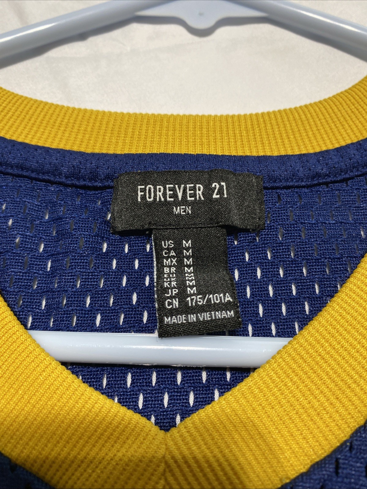 Forever 21 Size M Blue And Yellow Striped Legend Jersey gallery