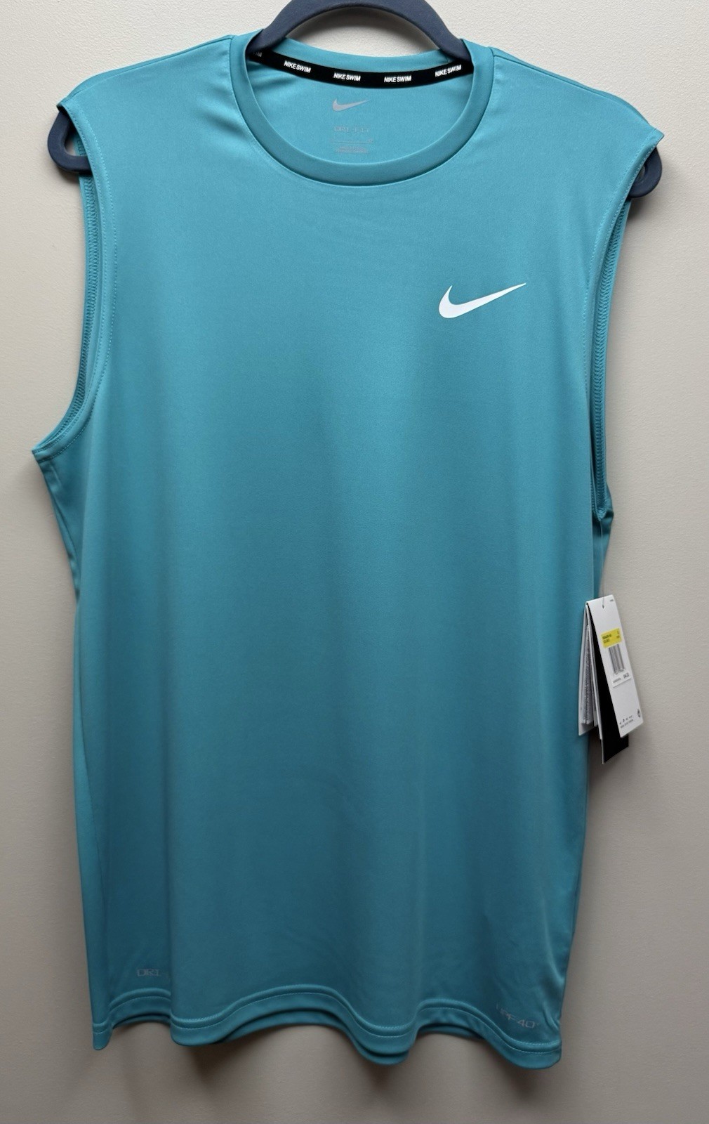 NEW Nike Men’s Essential Dri Fit Sleeveless Teal Hydroguard Swim Shirt Sz. S gallery