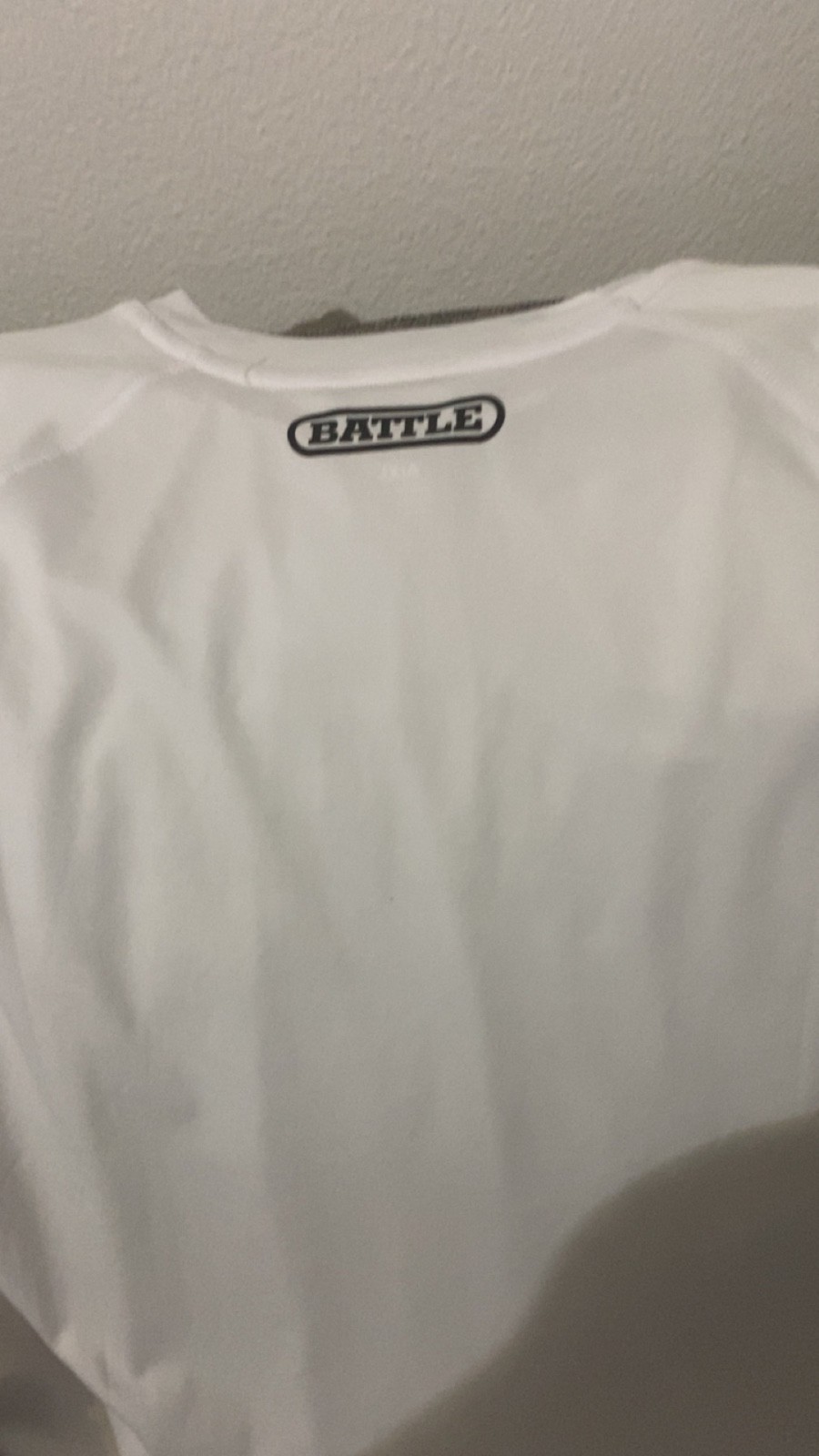 Battle Sports white performance long sleeve shirt with large black logo graphic gallery